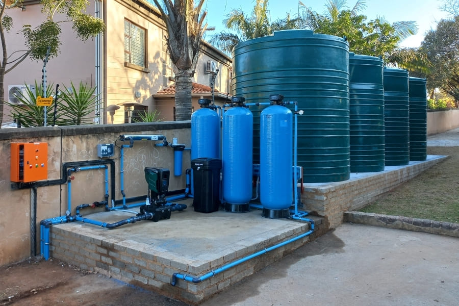 Borehole pump and water storage tanks installed together